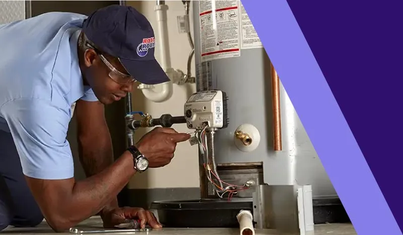 plumber fixing heater